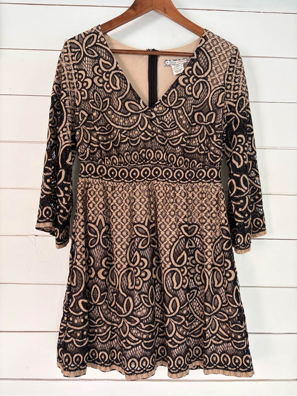 A. Calin by Flying Tomato tan & black lace overlay dress. Size: Small.